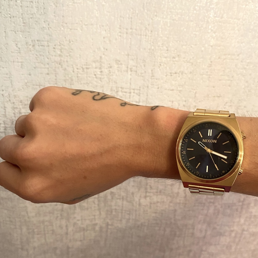 Gold Nixon Watch with Navy Blue Face